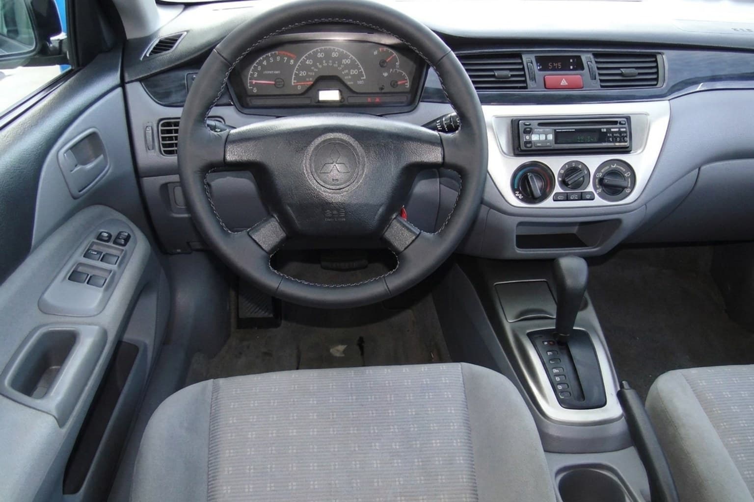 Салон Mitsubishi Lancer Combi — покраска руля | Автоателье BIRSON СПб